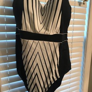 Flattering black and white bathing suit